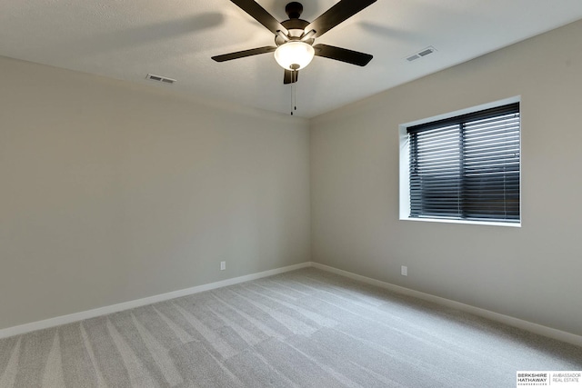 20709 Woodridge Dr, Gretna, NE 68028 - spare room featuring a ceiling fan and carpet flooring