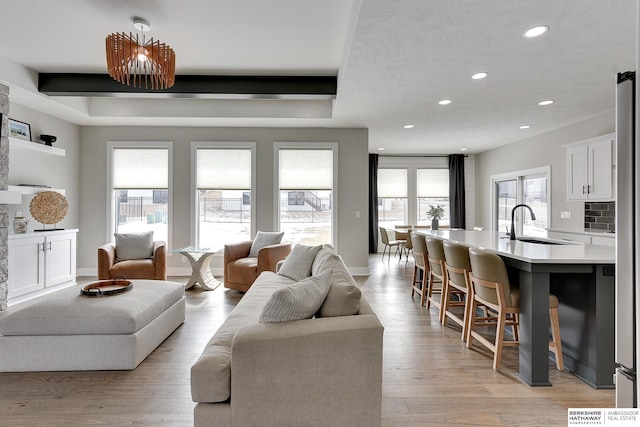20709 Woodridge Dr, Gretna, NE 68028 - living area with recessed lighting and light wood finished floors