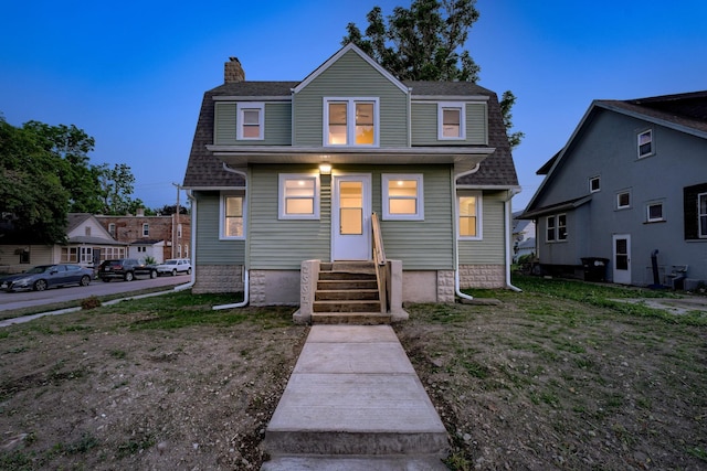 2551 Meredith Ave, Omaha, NE 68111 - view of front of property featuring entry steps and a chimney
