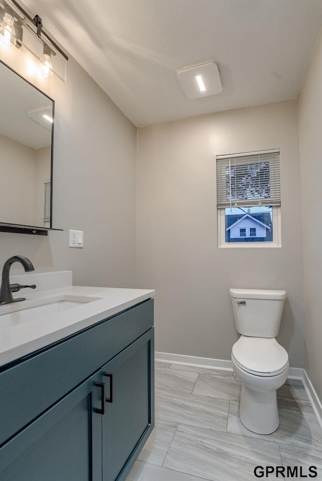 2551 Meredith Ave, Omaha, NE 68111 - bathroom featuring vanity and toilet