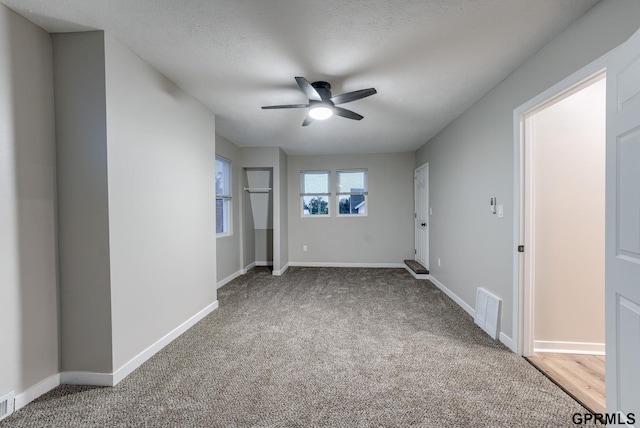 2551 Meredith Ave, Omaha, NE 68111 - unfurnished bedroom featuring carpet floors and ceiling fan