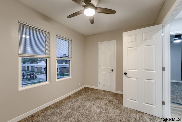 2551 Meredith Ave, Omaha, NE 68111 - unfurnished bedroom with carpet floors and a ceiling fan