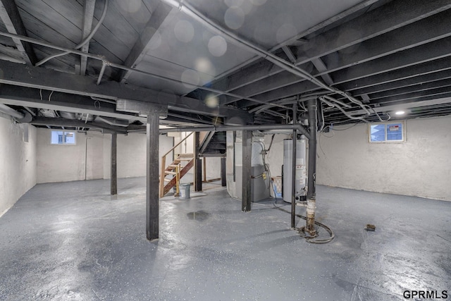 2551 Meredith Ave, Omaha, NE 68111 - basement with stairway and gas water heater