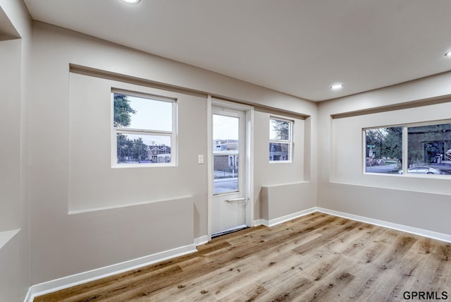 2551 Meredith Ave, Omaha, NE 68111 - unfurnished room with light wood-style flooring and recessed lighting