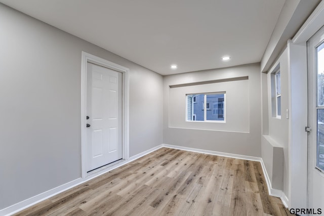 2551 Meredith Ave, Omaha, NE 68111 - empty room featuring light wood-style floors and recessed lighting