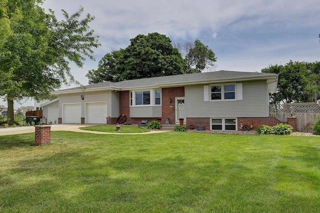 4625 S 222nd St, Elkhorn, NE 68022 - bi-level home with a garage, driveway, and brick siding