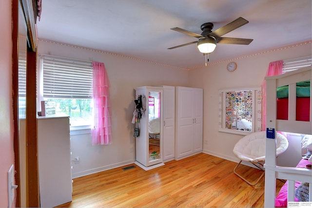 4625 S 222nd St, Elkhorn, NE 68022 - bedroom featuring light wood-type flooring and ceiling fan