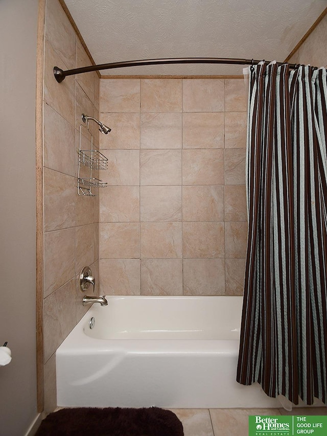 9705 Cady Ave, Omaha, NE 68134 - bathroom with shower / bathtub combination with curtain and tile patterned flooring