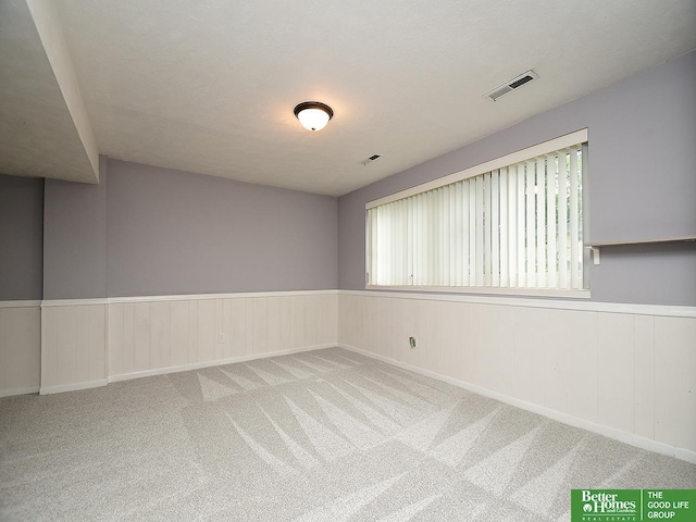 9705 Cady Ave, Omaha, NE 68134 - spare room with carpet floors and wainscoting