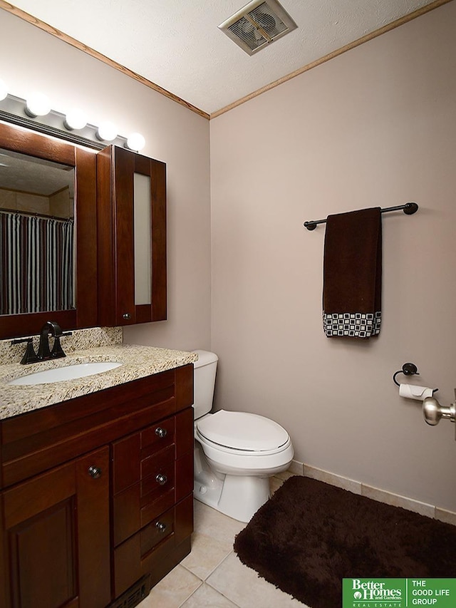 9705 Cady Ave, Omaha, NE 68134 - bathroom featuring vanity, tile patterned floors, and crown molding