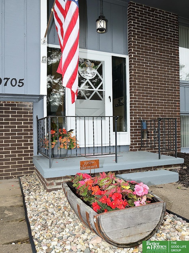 9705 Cady Ave, Omaha, NE 68134 - entrance to property featuring brick siding and a porch