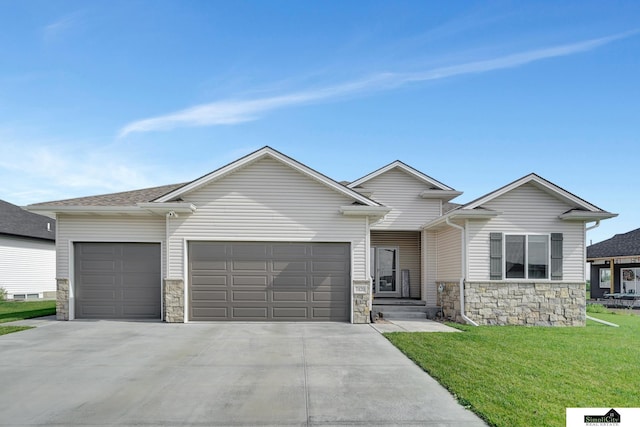 7420 Isidore Dr, Lincoln, NE 68516 - view of front of property with stone siding, a garage, concrete driveway, and a front lawn