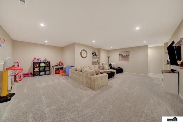 7420 Isidore Dr, Lincoln, NE 68516 - carpeted living area with recessed lighting and baseboards