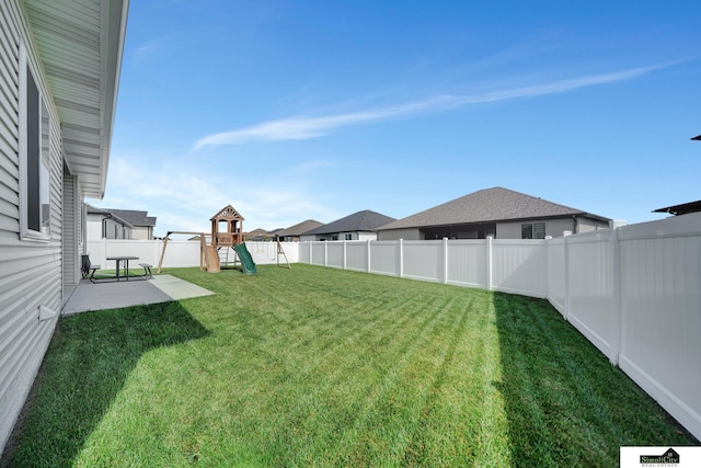 7420 Isidore Dr, Lincoln, NE 68516 - fenced backyard with a playground and a patio
