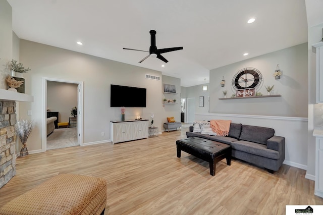 7420 Isidore Dr, Lincoln, NE 68516 - living room featuring a ceiling fan, light wood-type flooring, a fireplace, and recessed lighting