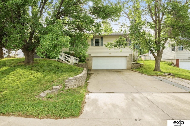 813 Janes View St, Papillion, NE 68046 - view of front facade featuring an attached garage, a front lawn, and concrete driveway