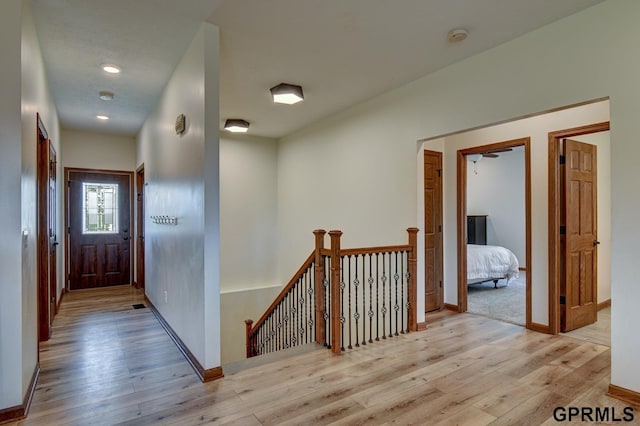 3320 Fairway Dr, Plattsmouth, NE 68048 - hall with an upstairs landing and wood finished floors