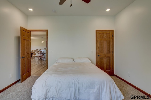 3320 Fairway Dr, Plattsmouth, NE 68048 - carpeted bedroom with a ceiling fan and recessed lighting