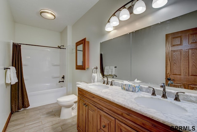 3320 Fairway Dr, Plattsmouth, NE 68048 - bathroom featuring double vanity, shower / tub combo, and wood finished floors
