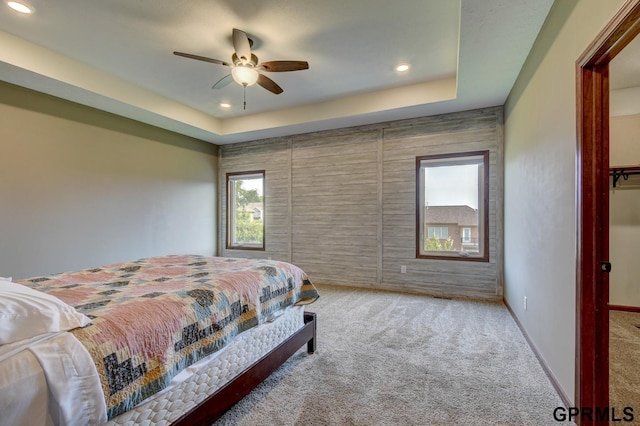 3320 Fairway Dr, Plattsmouth, NE 68048 - carpeted bedroom with recessed lighting, ceiling fan, and a tray ceiling