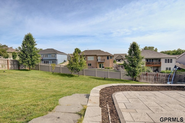 3320 Fairway Dr, Plattsmouth, NE 68048 - fenced backyard with a residential view and a trampoline