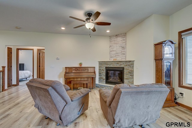 3320 Fairway Dr, Plattsmouth, NE 68048 - living area featuring ceiling fan, light wood-style floors, a fireplace, recessed lighting, and plenty of natural light