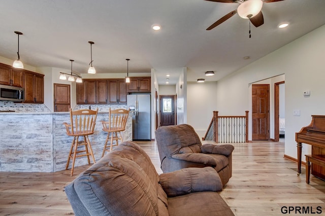 3320 Fairway Dr, Plattsmouth, NE 68048 - living room featuring ceiling fan, light wood-style floors, and recessed lighting