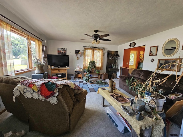 607 4th St, Edgar, NE 68935 - living area featuring ceiling fan and a textured ceiling