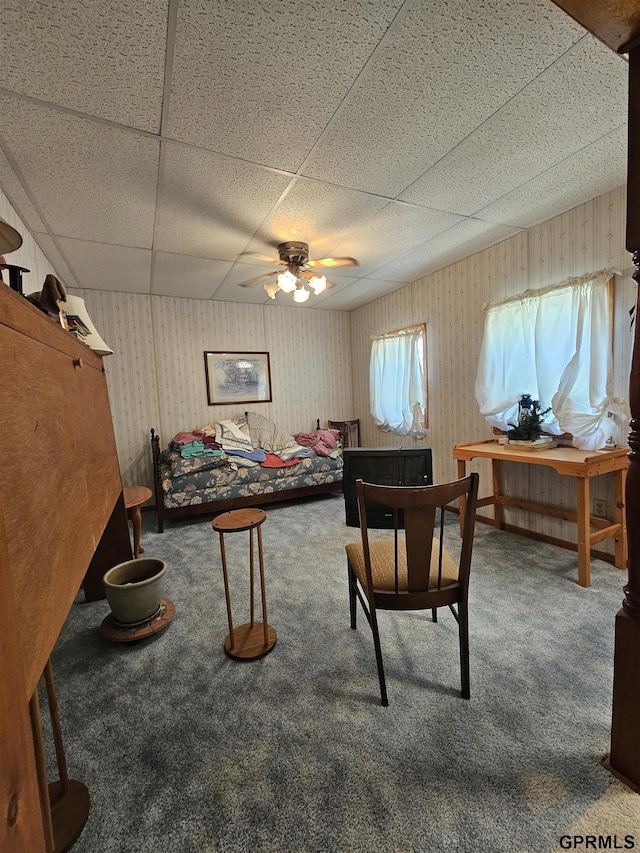 607 4th St, Edgar, NE 68935 - dining space with a ceiling fan, carpet flooring, and a drop ceiling