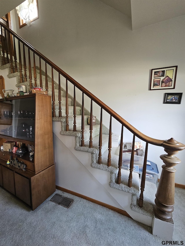 607 4th St, Edgar, NE 68935 - stairs featuring carpet floors and baseboards