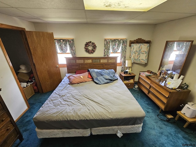 607 4th St, Edgar, NE 68935 - bedroom featuring a paneled ceiling and dark colored carpet