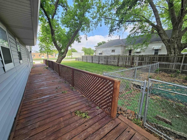 607 4th St, Edgar, NE 68935 - wooden deck with a fenced backyard