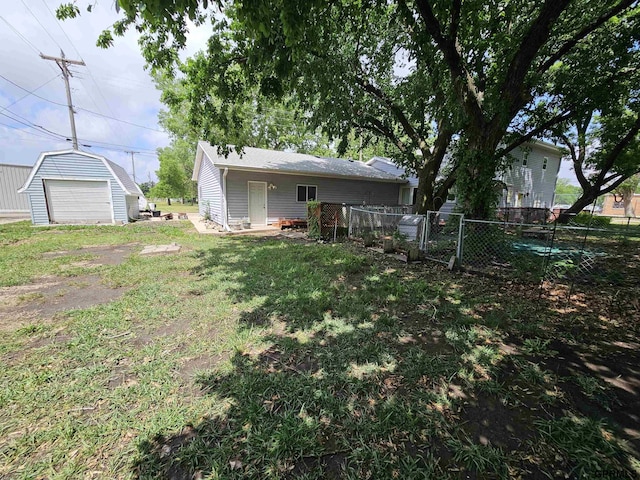 607 4th St, Edgar, NE 68935 - view of yard with a garage and an outbuilding