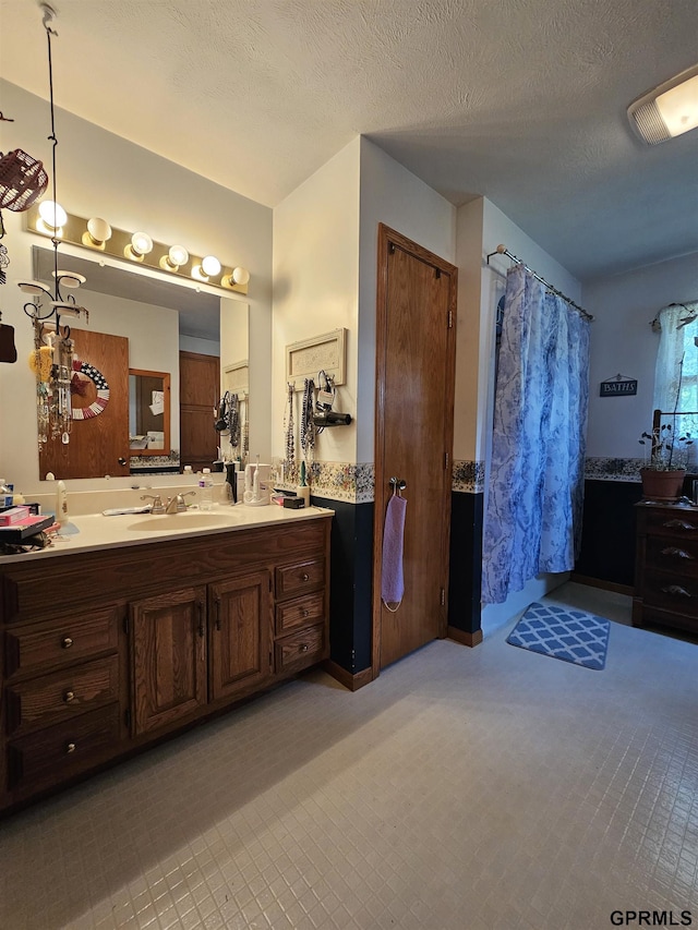 607 4th St, Edgar, NE 68935 - full bath featuring vanity and a textured ceiling