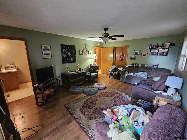 607 4th St, Edgar, NE 68935 - living room featuring a ceiling fan and wood finished floors