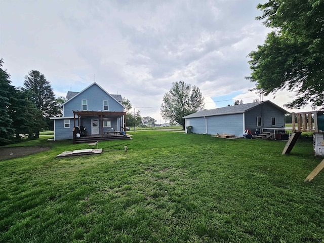 401 Chestnut Ave, Saronville, NE 68975 - view of green lawn featuring a wooden deck