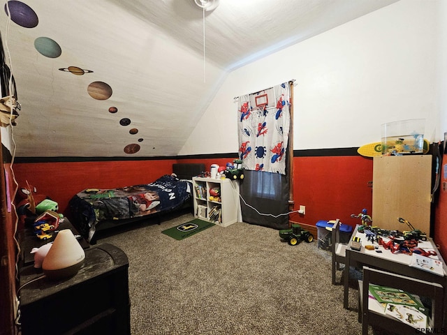 401 Chestnut Ave, Saronville, NE 68975 - carpeted bedroom featuring vaulted ceiling and baseboards