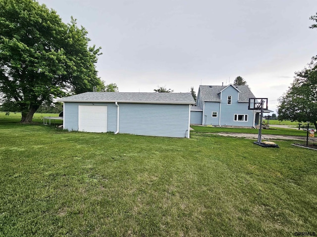 401 Chestnut Ave, Saronville, NE 68975 - view of grassy yard with an outdoor structure and a garage
