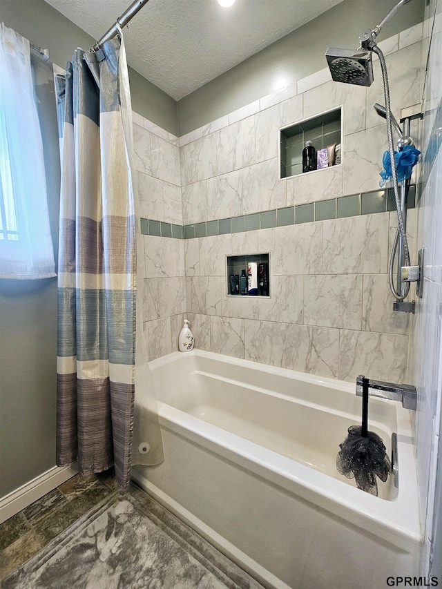 108 W Ridge St, Sutton, NE 68979 - bathroom featuring shower / bath combination with curtain, a textured ceiling, and marble finish flooring