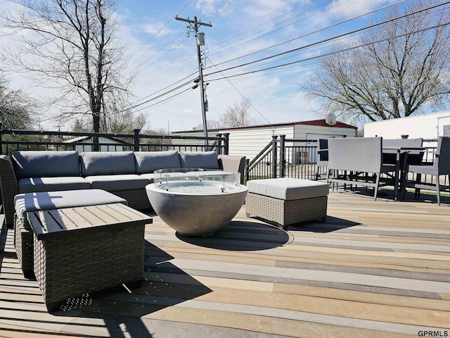 108 W Ridge St, Sutton, NE 68979 - wooden terrace featuring an outdoor living space with a fire pit and outdoor dining area