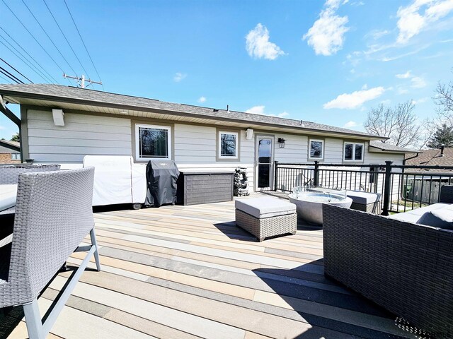 108 W Ridge St, Sutton, NE 68979 - wooden deck with grilling area and an outdoor living space