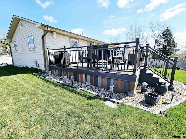 108 W Ridge St, Sutton, NE 68979 - back of property featuring a wooden deck and a lawn