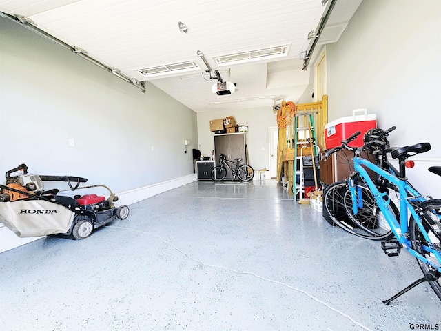 108 W Ridge St, Sutton, NE 68979 - garage featuring a garage door opener