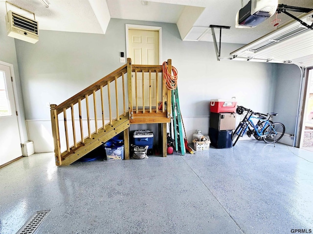 108 W Ridge St, Sutton, NE 68979 - garage featuring a garage door opener and a heating unit