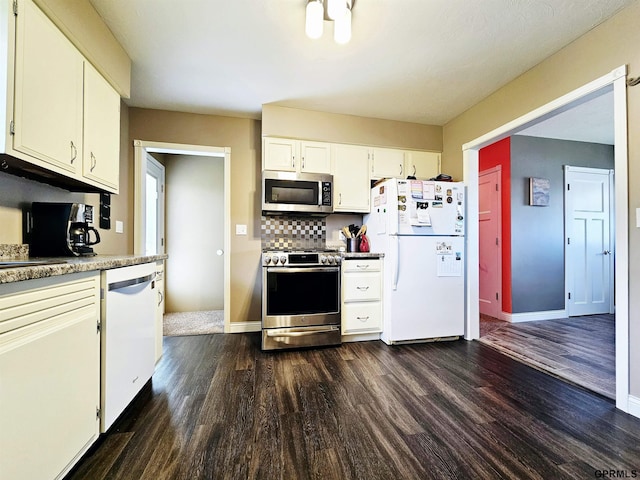 108 W Ridge St, Sutton, NE 68979 - kitchen featuring appliances with stainless steel finishes, dark wood-style floors, white cabinetry, and light countertops