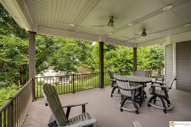 7409 Elk Creek Dr, Lincoln, NE 68516 - view of patio / terrace featuring outdoor dining space, ceiling fan, and a deck