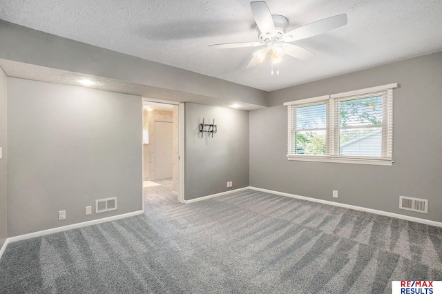605 S 120th Ave, Omaha, NE 68154 - carpeted empty room with a textured ceiling and a ceiling fan