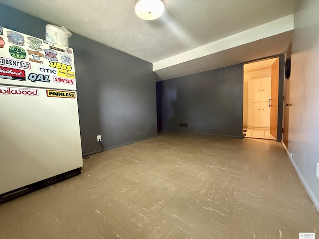 400 W Broadview St, Lincoln, NE 68505 - empty room featuring baseboards and tile patterned floors