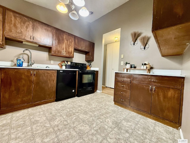 400 W Broadview St, Lincoln, NE 68505 - kitchen featuring black appliances, light countertops, and a chandelier