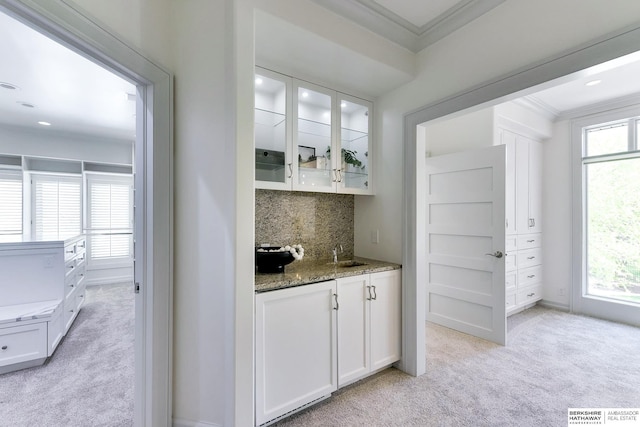 14341 Hamilton St, Omaha, NE 68154 - bar area with light colored carpet, ornamental molding, tasteful backsplash, and recessed lighting